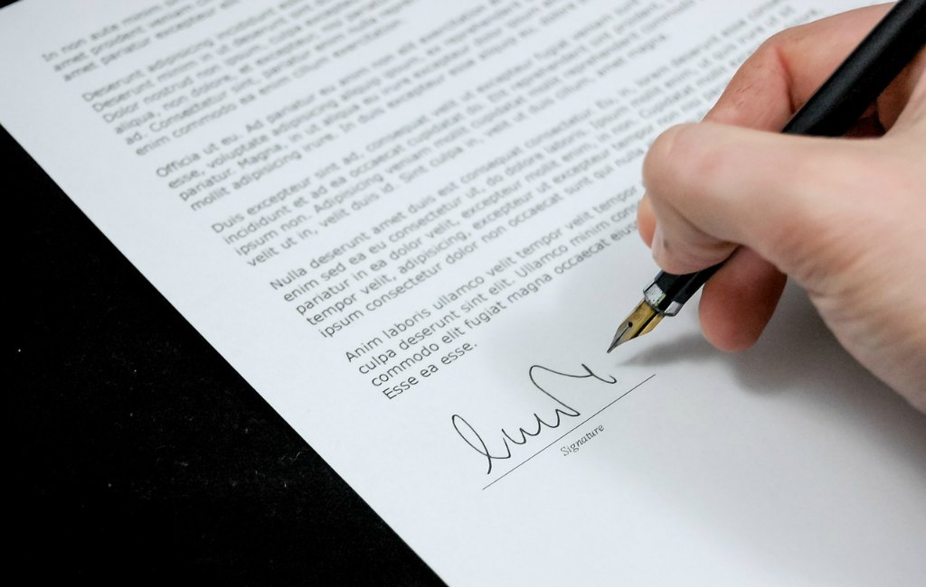 founder agreement template draft paper pen signature written
